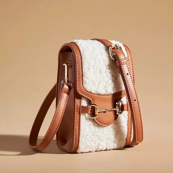 Anthropologie Handbags - Anthropologie Sherpa Cell Crossbody Bag with a sherpa and faux leather exterior